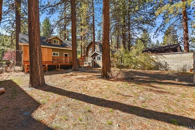 a view of a yard covered in snow