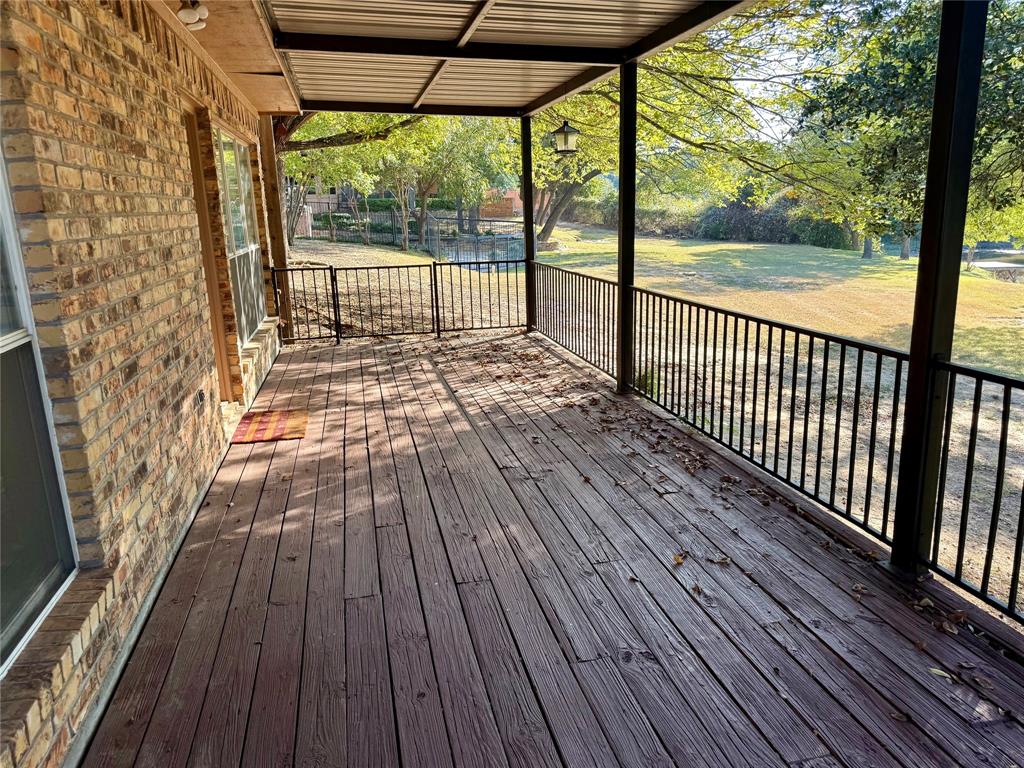 2116 Clear Lake Road Weatherford, TX 76087 - Photo 13 of 21 a view of a wooden deck