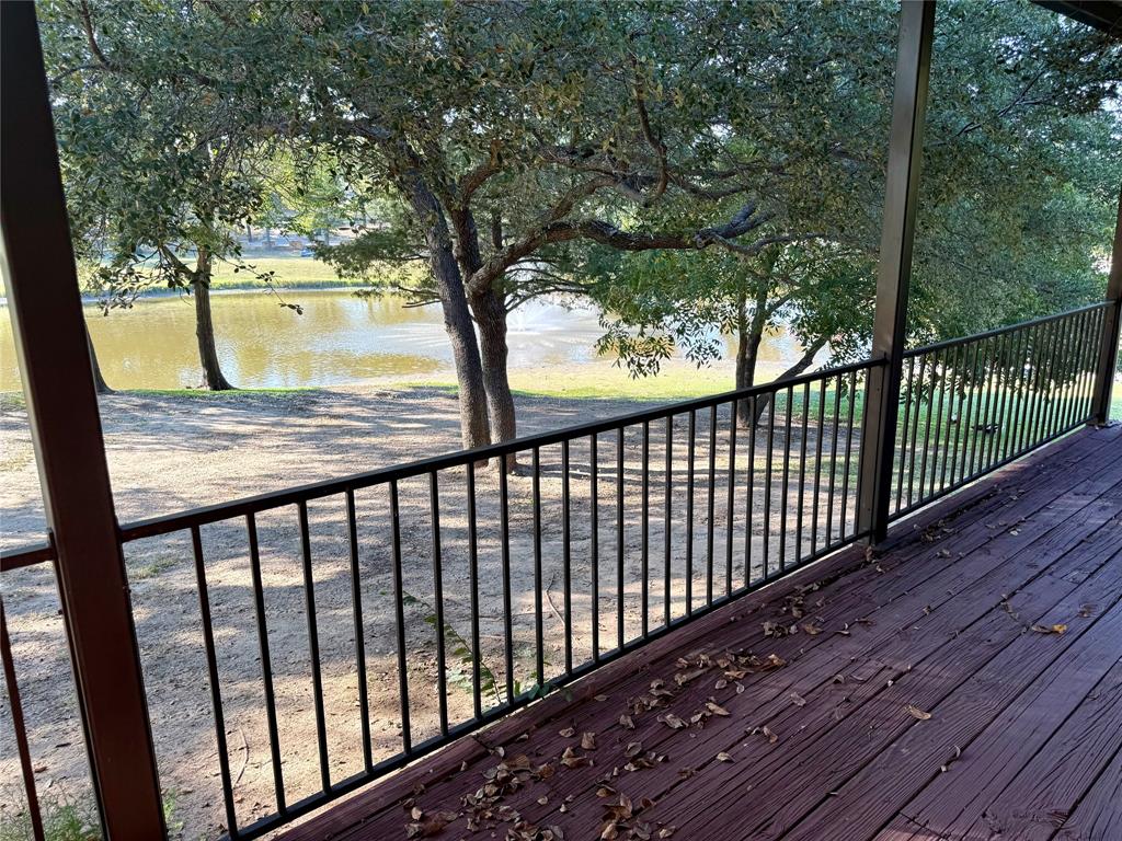2116 Clear Lake Road Weatherford, TX 76087 - Photo 14 of 21 a view of balcony with wooden floor