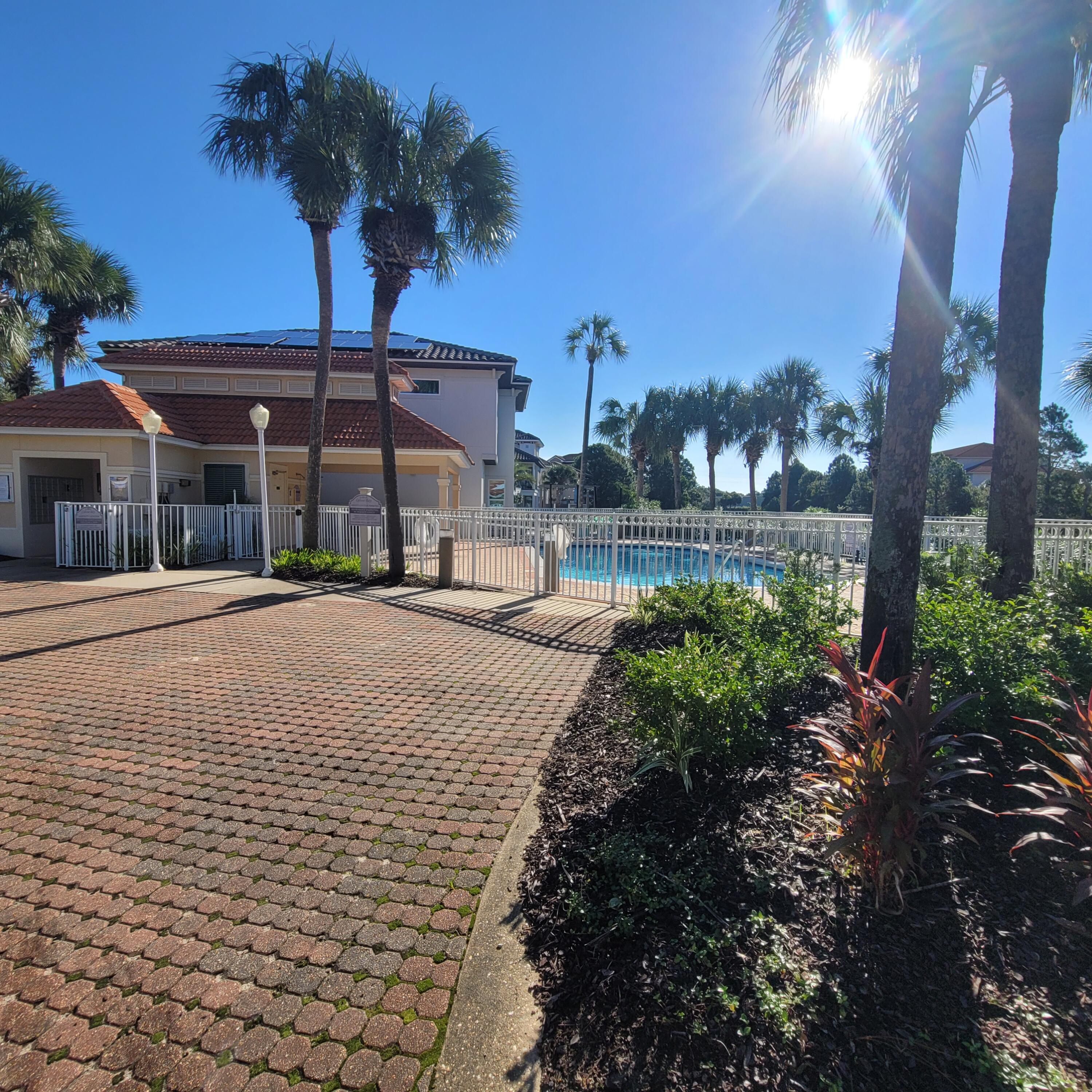 235 Inverrary Drive Destin, FL 32541 - Photo 4 of 8 a view of a house with a yard