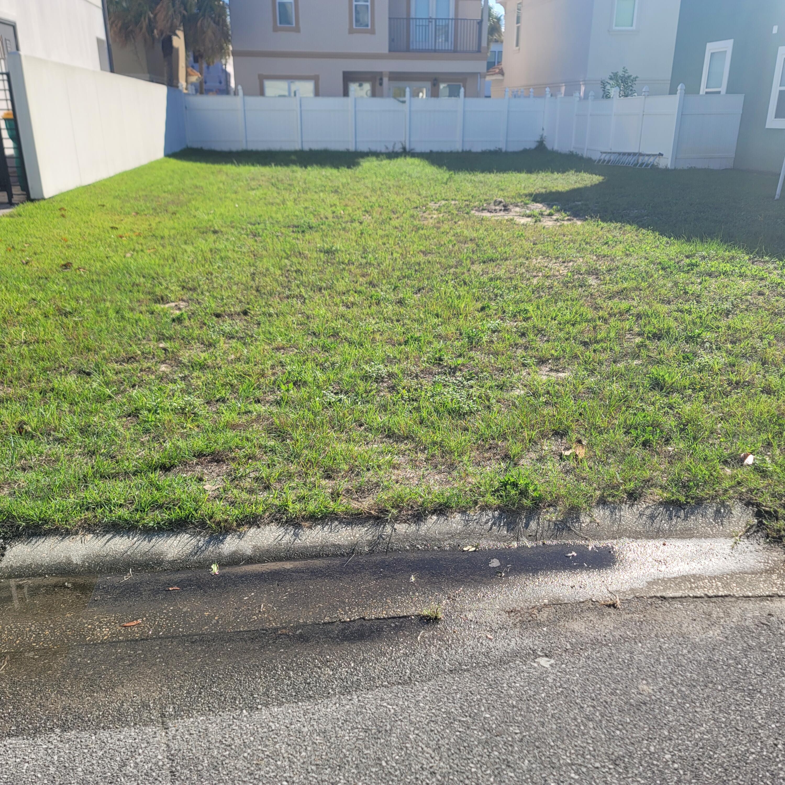 235 Inverrary Drive Destin, FL 32541 - Photo 7 of 8 a view of a backyard
