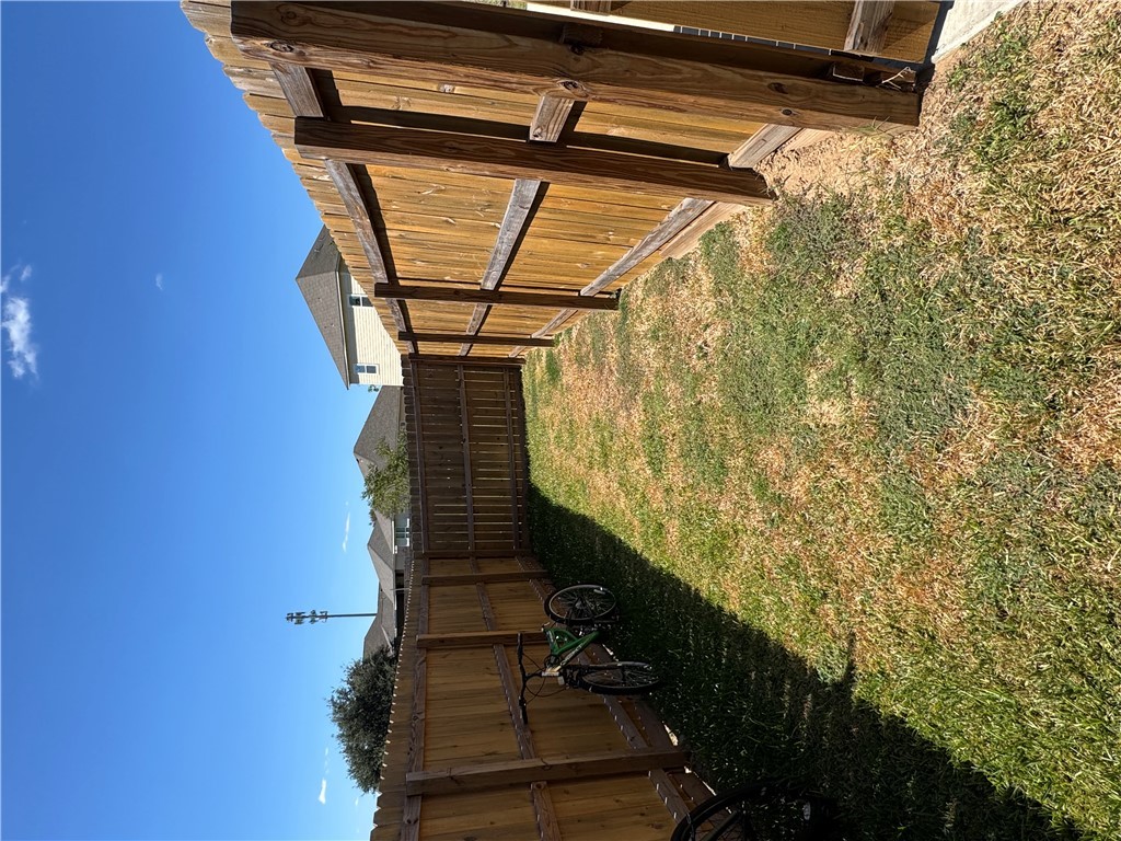 6991 Halter Loop College Station, TX 77845 - Photo 6 of 8 a view of a backyard