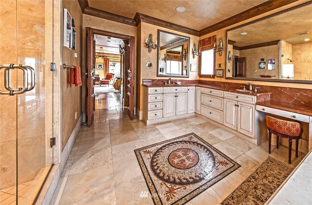 a living room with furniture fireplace and flat screen tv