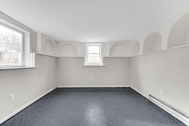 an empty room with a window