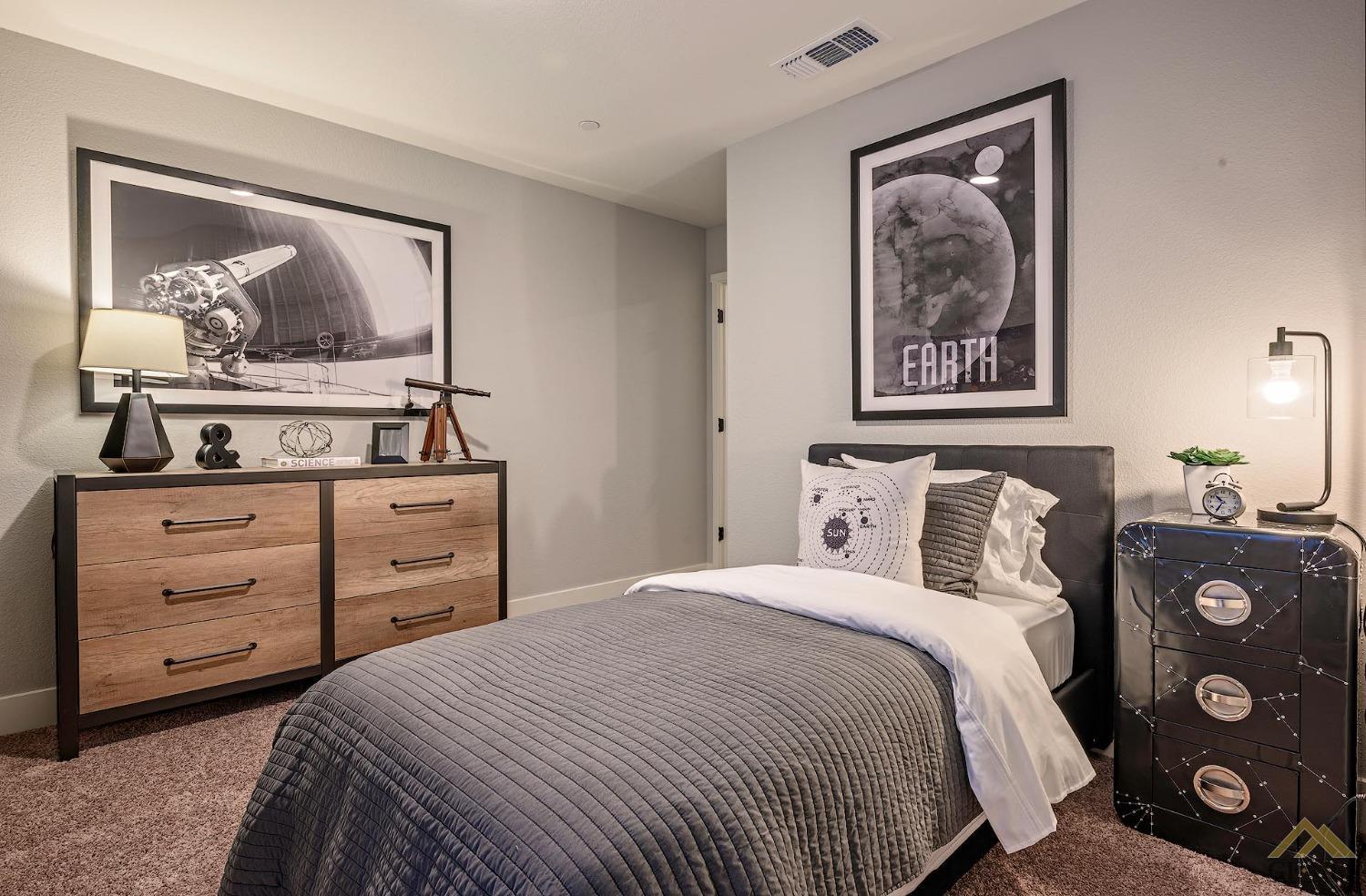 Undisclosed Address Bakersfield, CA 93311 - Photo 16 of 19 a bedroom with a bed and a dresser