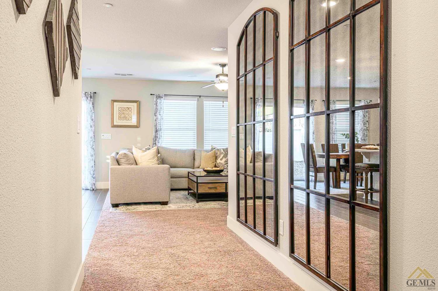 Undisclosed Address Bakersfield, CA 93311 - Photo 19 of 19 a living room with furniture and a large window