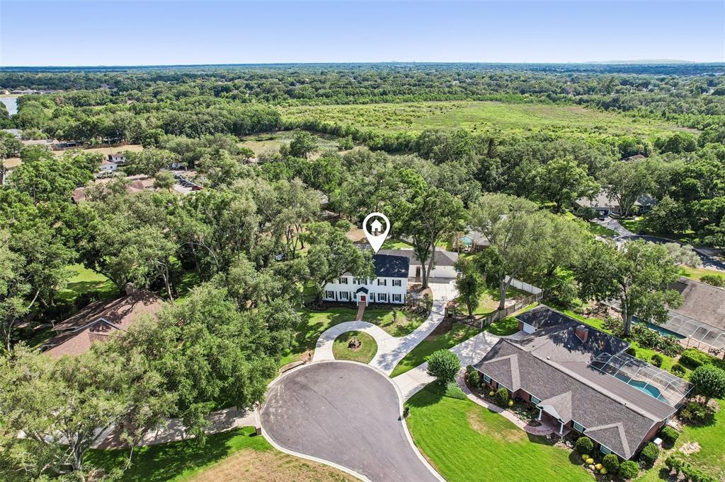 1012 Morfield Lane Brandon, FL 33511 - Photo 100 of 100 an aerial view of a residential houses with outdoor space and trees all around
