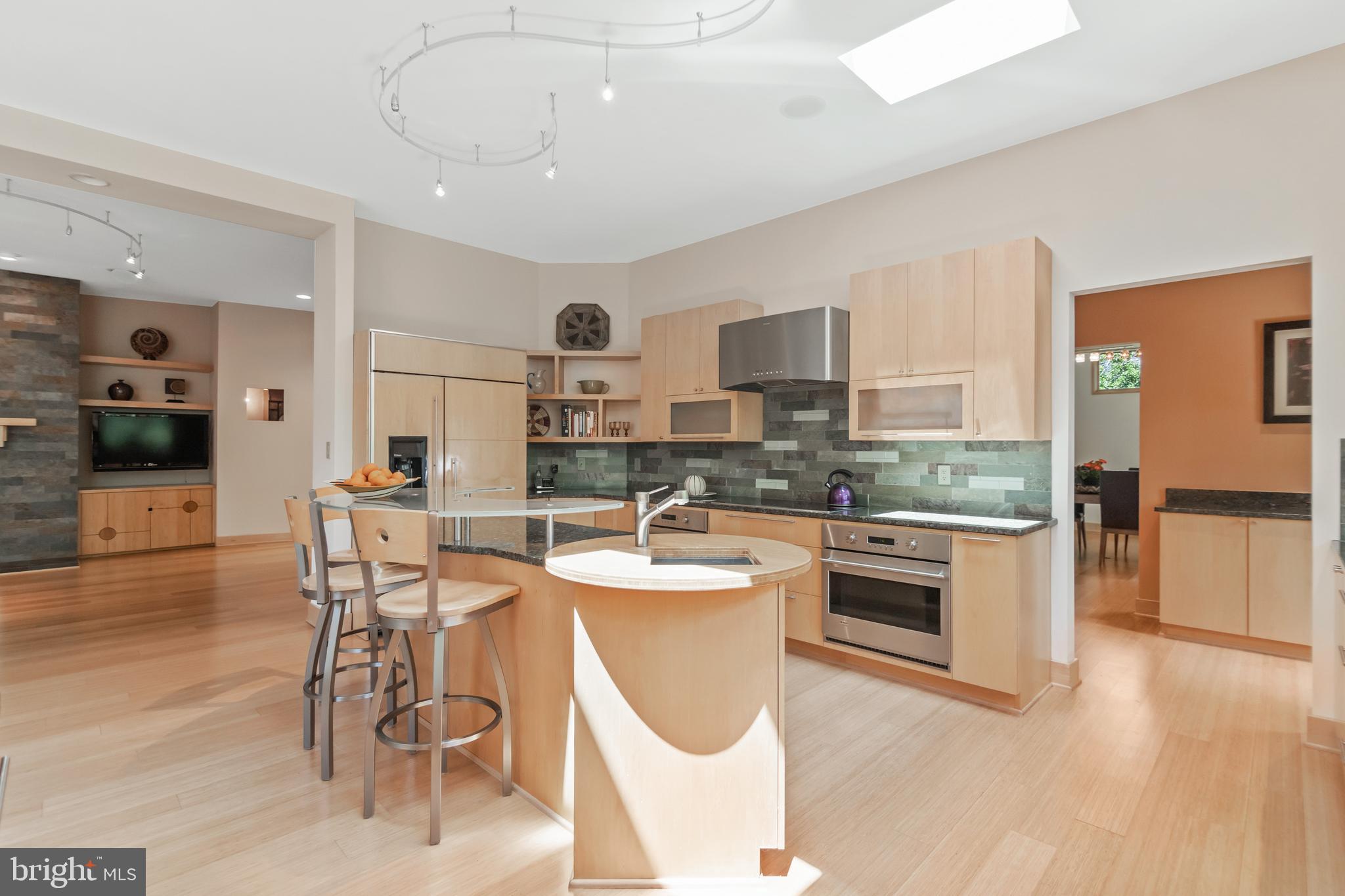 10107 Gary Road Potomac, MD 20854 - Photo 15 of 62 Chef's Kitchen Opens to Family Room