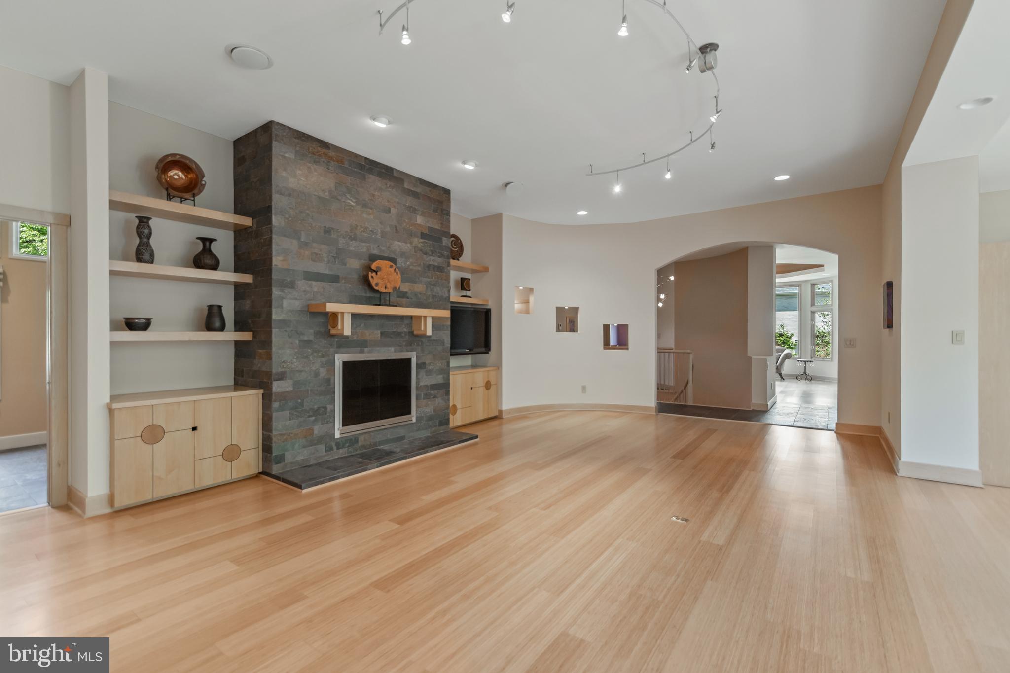 10107 Gary Road Potomac, MD 20854 - Photo 19 of 62 Family Room with Stone Fireplace and Hearth