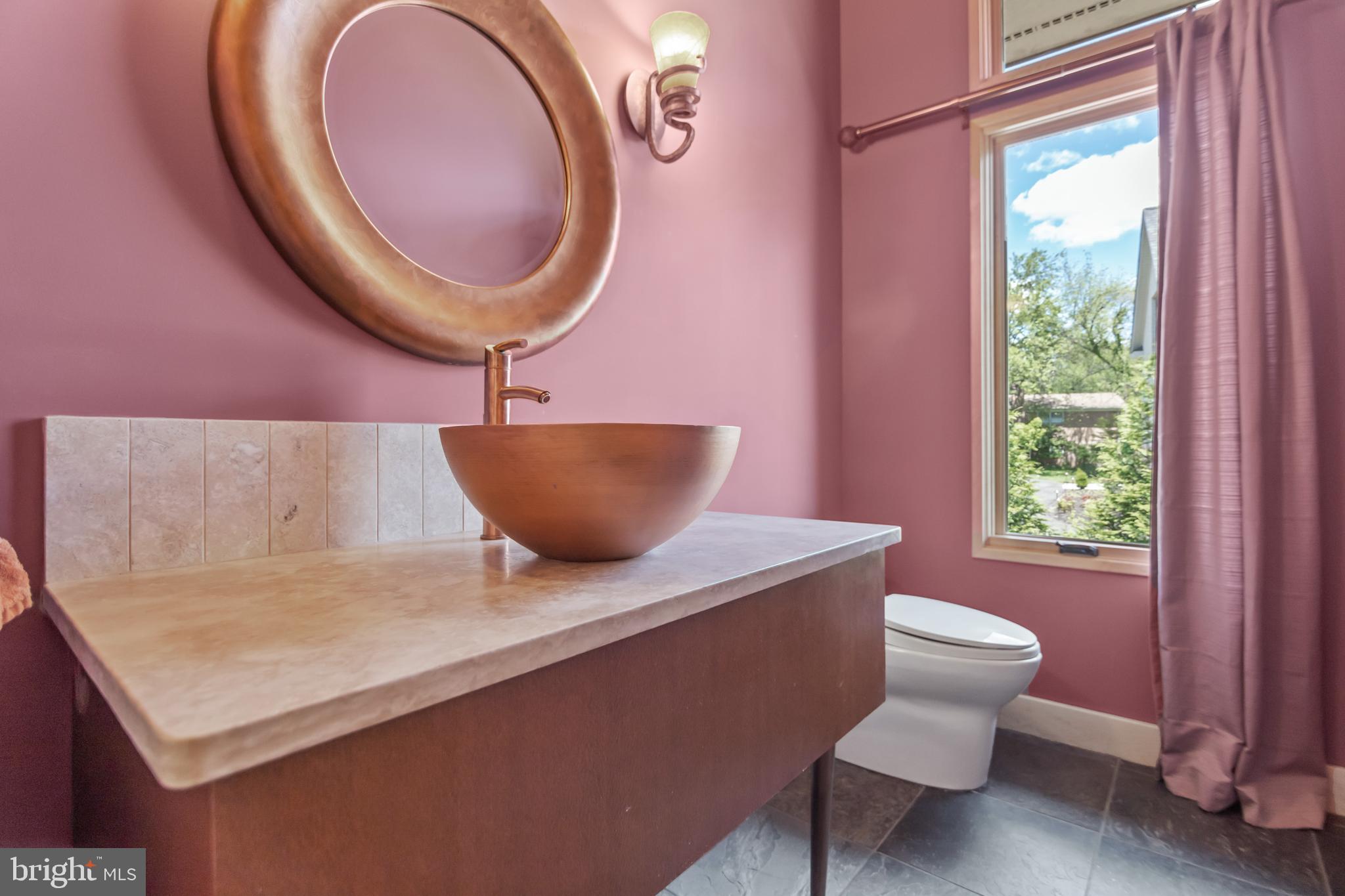 10107 Gary Road Potomac, MD 20854 - Photo 23 of 62 Powder Room with Copper Basin