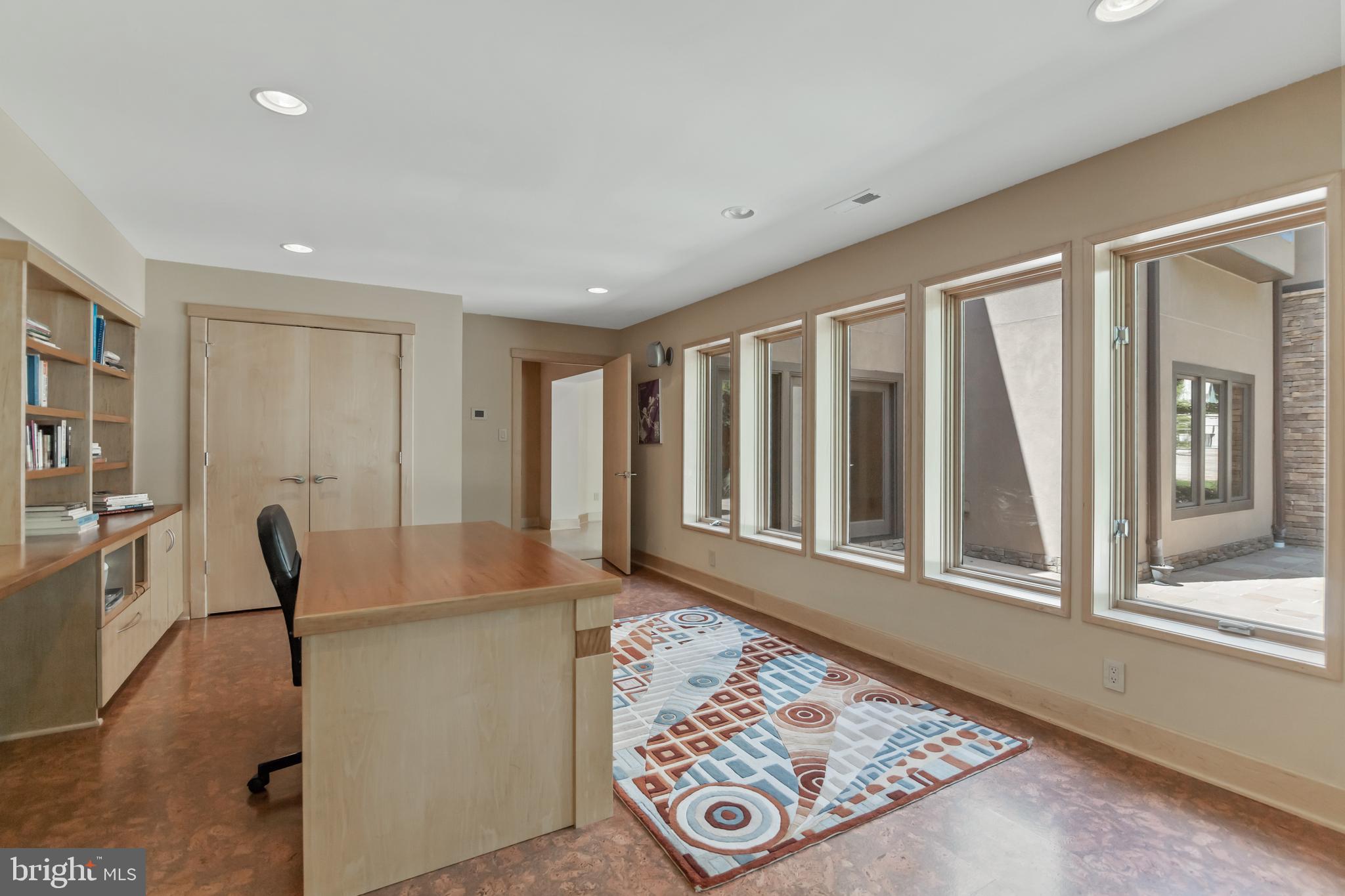 10107 Gary Road Potomac, MD 20854 - Photo 51 of 62 Lower Level Office overlooks stone patio and yard