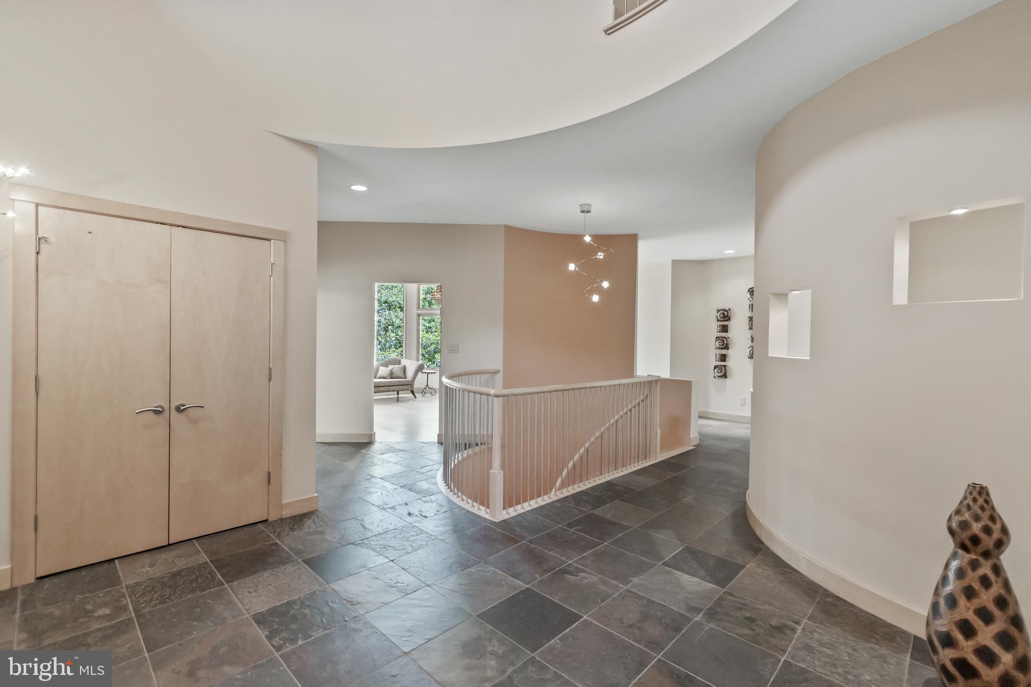 10107 Gary Road Potomac, MD 20854 - Photo 7 of 62 Foyer with Designer Light Fixture