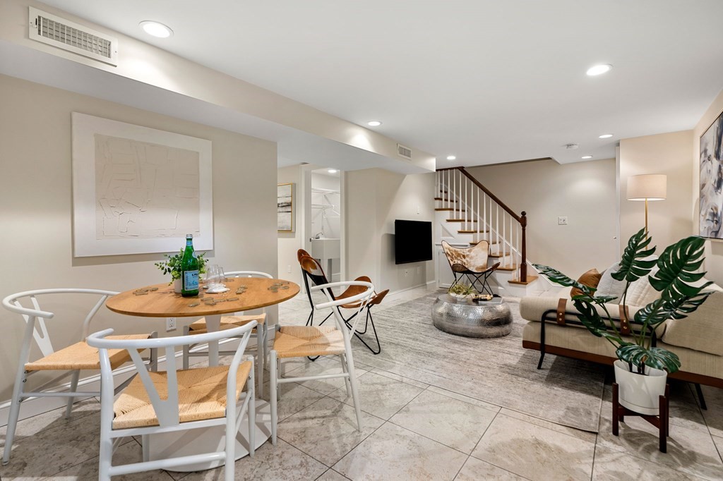 36 Leicester Road Belmont, MA 02478 - Photo 17 of 42 a living room with furniture kitchen and a table