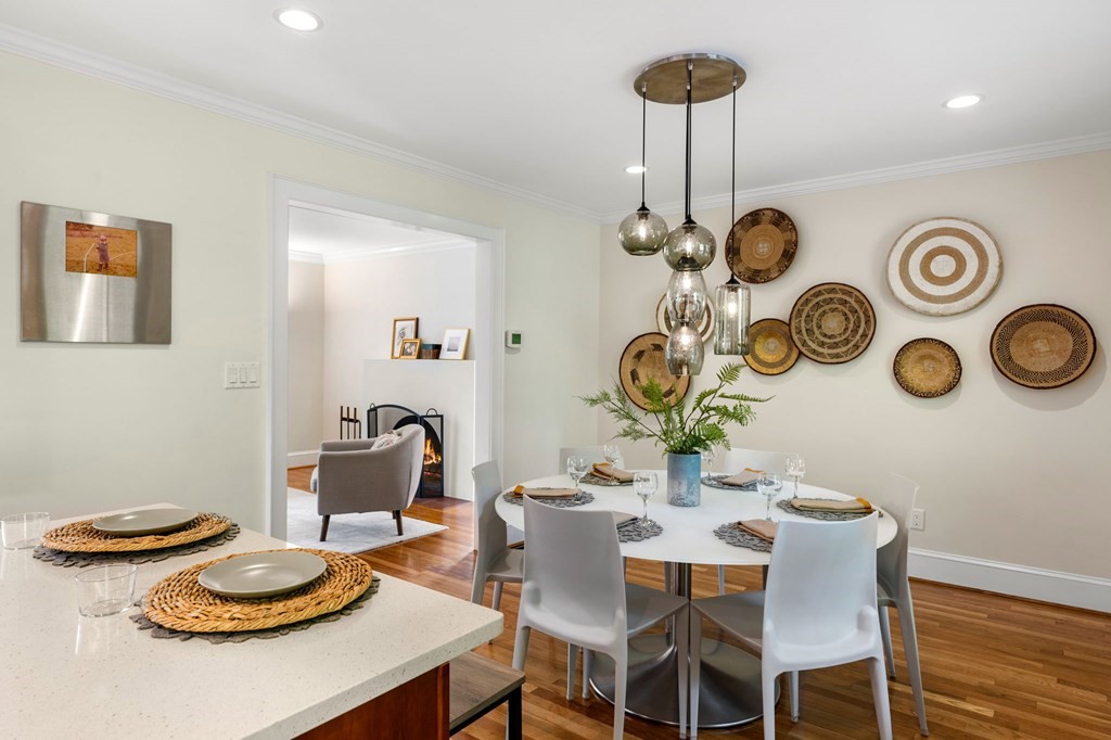 36 Leicester Road Belmont, MA 02478 - Photo 8 of 42 a dining room with furniture and a table