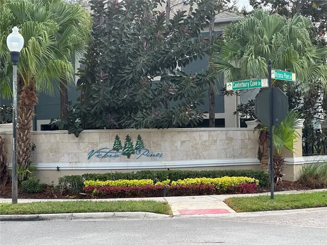a view of yard with large trees