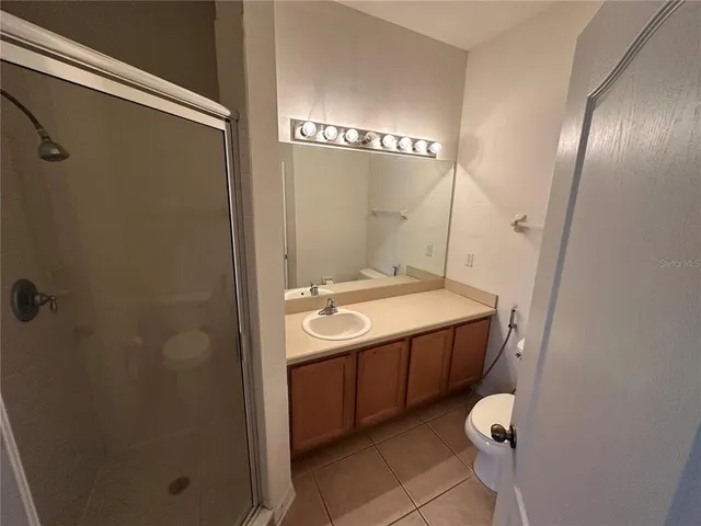 a view of swimming pool with seating space