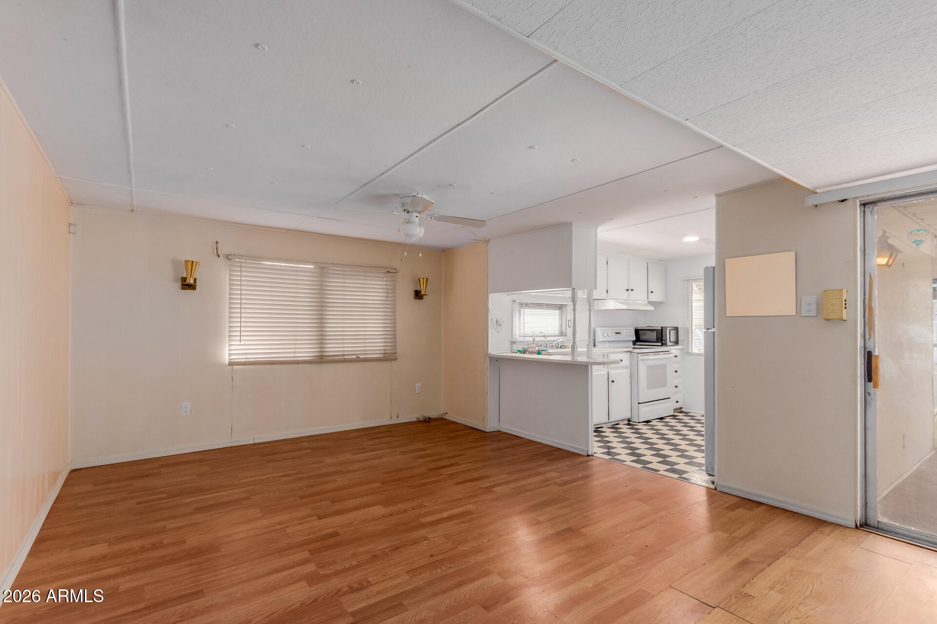 2434 East Main Street, Unit 123 Mesa, AZ 85213 - Photo 11 of 29 a view of a kitchen with wooden floor