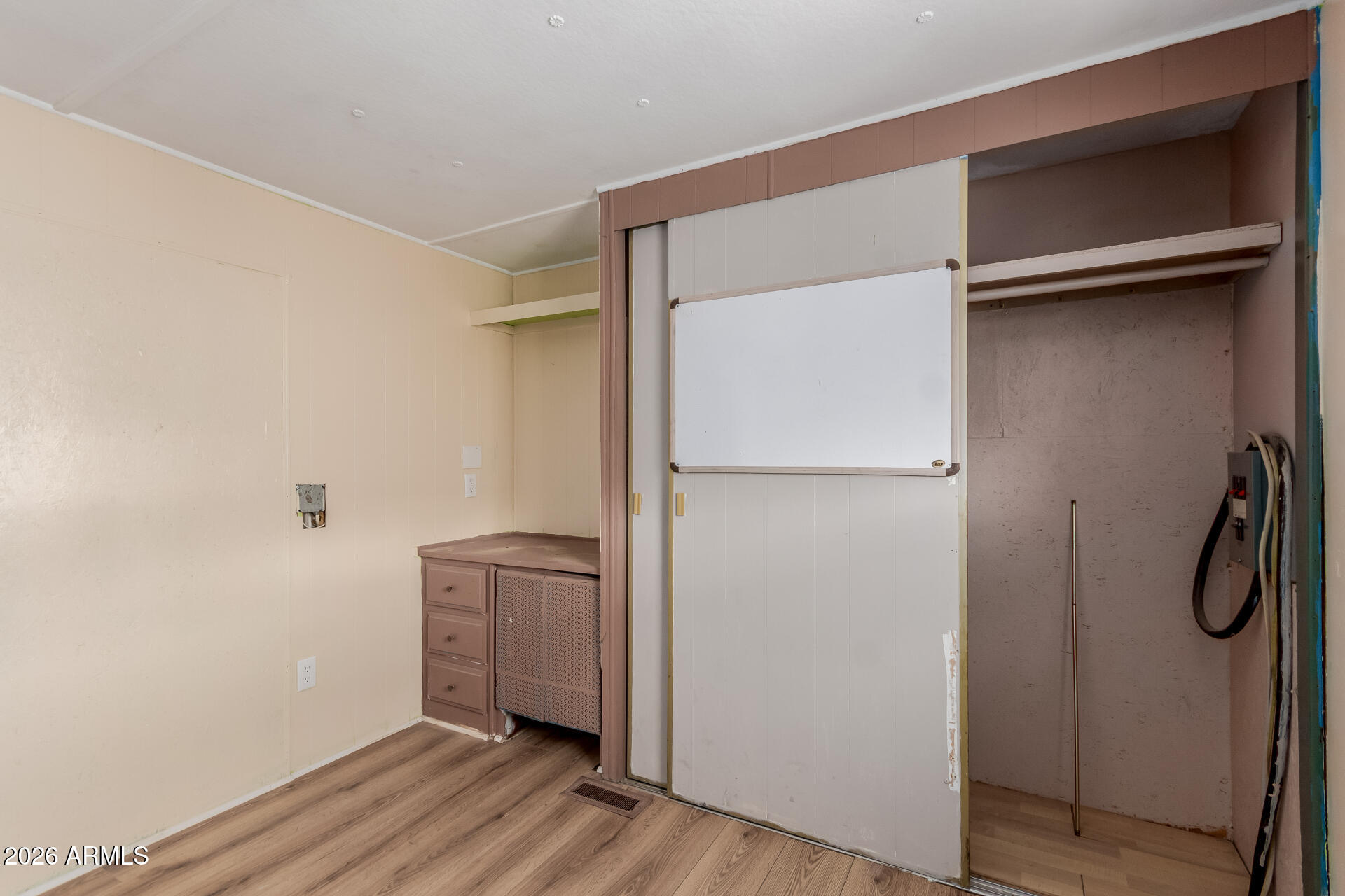 2434 East Main Street, Unit 123 Mesa, AZ 85213 - Photo 23 of 29 a view of walk in closet with wooden floor