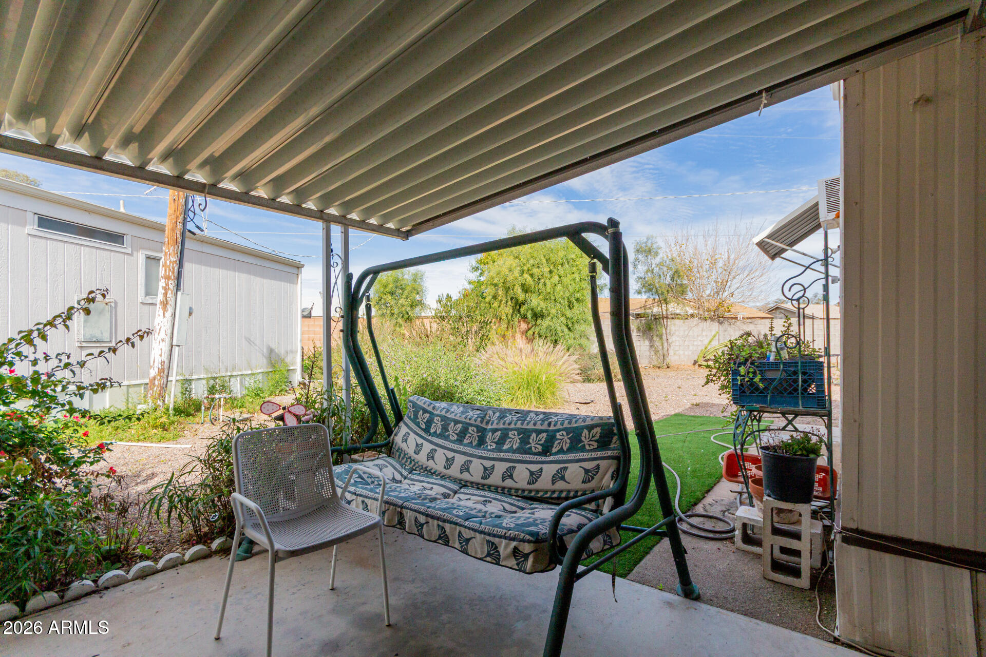 2434 East Main Street, Unit 123 Mesa, AZ 85213 - Photo 28 of 29 a view of two chairs in the balcony