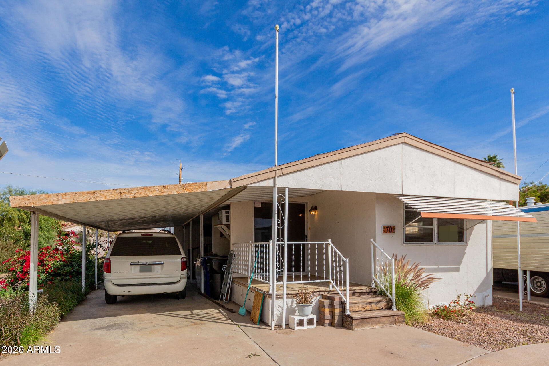2434 East Main Street, Unit 123 Mesa, AZ 85213 - Photo 4 of 29 a view of a car garage of the house