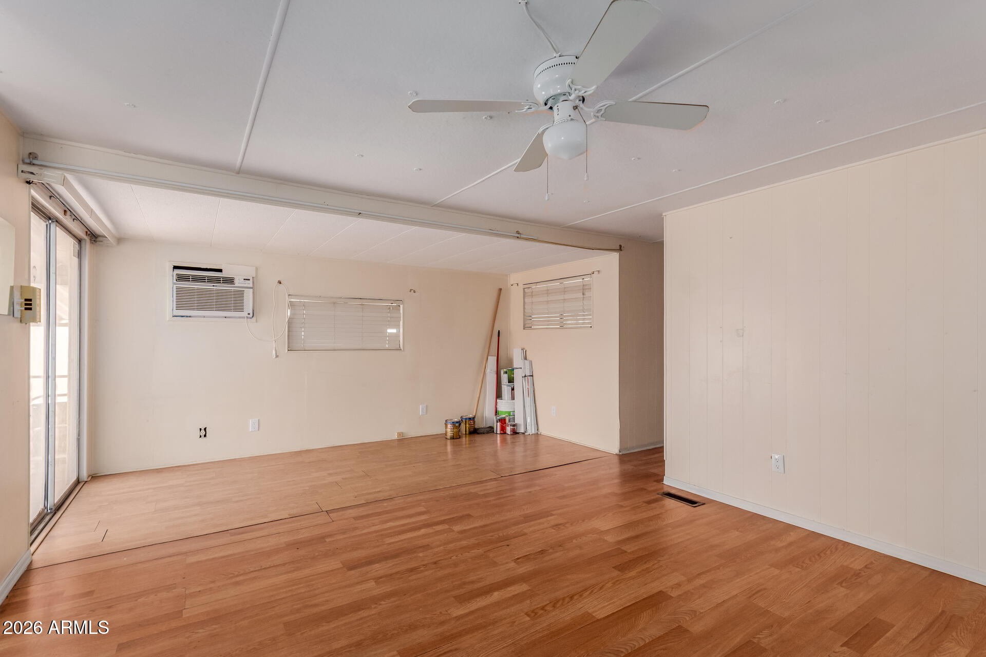 2434 East Main Street, Unit 123 Mesa, AZ 85213 - Photo 9 of 29 a view of empty room with wooden floor