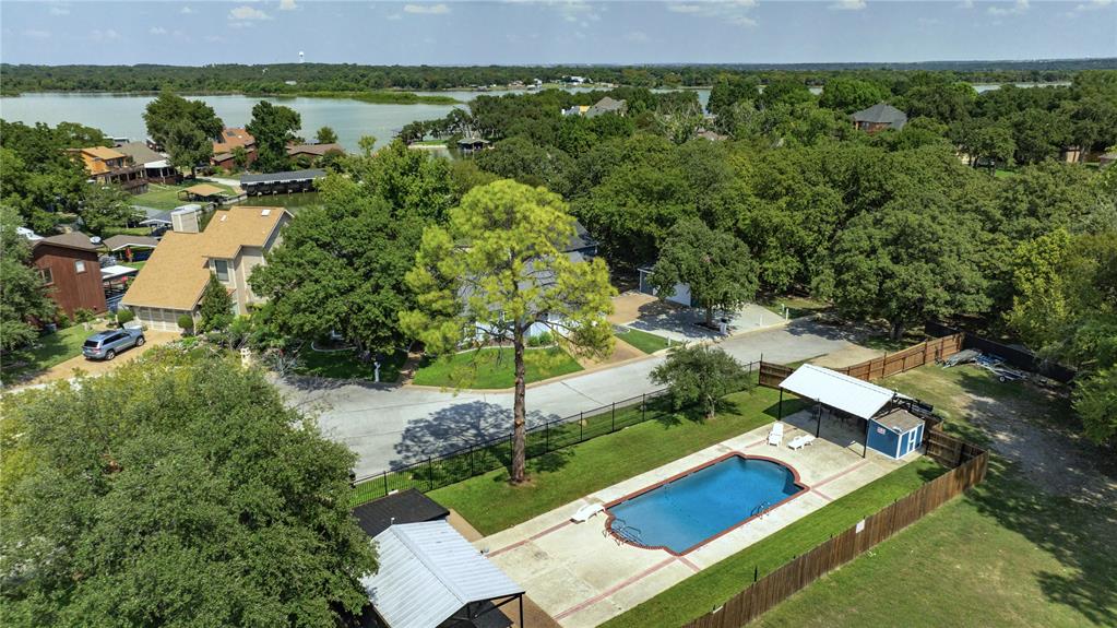 504 Harbor Drive South Azle, TX 76020 - Photo 14 of 25 an aerial view of a house with a garden