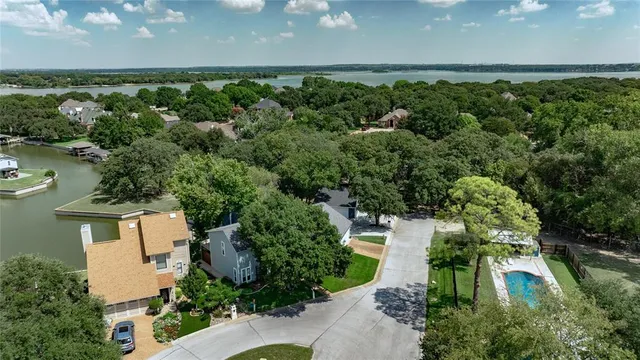 an aerial view of a houses with outdoor space