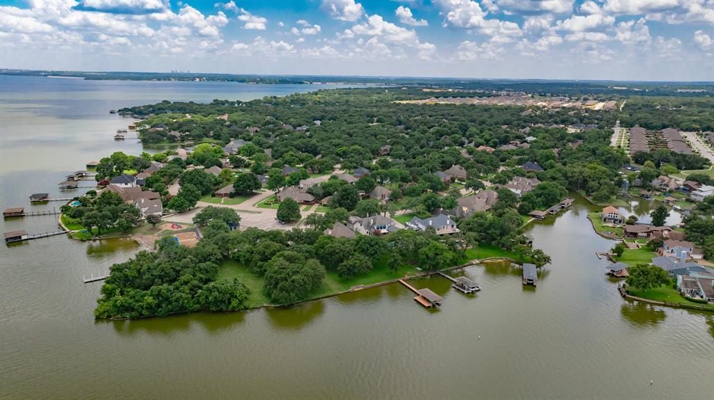 504 Harbor Drive South Azle, TX 76020 - Photo 17 of 25 a view of a lake with a city