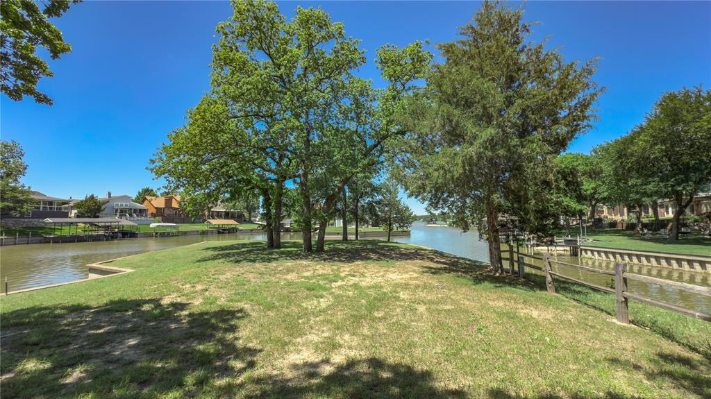 504 Harbor Drive South Azle, TX 76020 - Photo 24 of 25 a view of a lake with houses