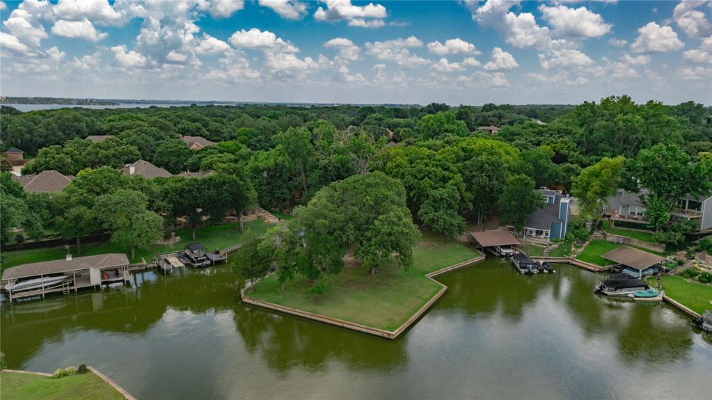 504 Harbor Drive South Azle, TX 76020 - Photo 6 of 25 a view of a lake with a yard
