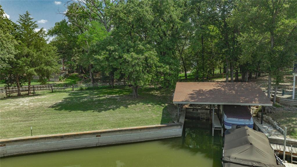 504 Harbor Drive South Azle, TX 76020 - Photo 9 of 25 a view of a swimming pool with a patio