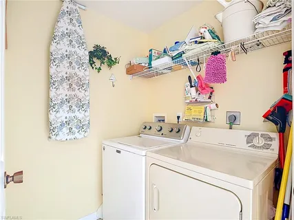 a utility room with dryer and washer