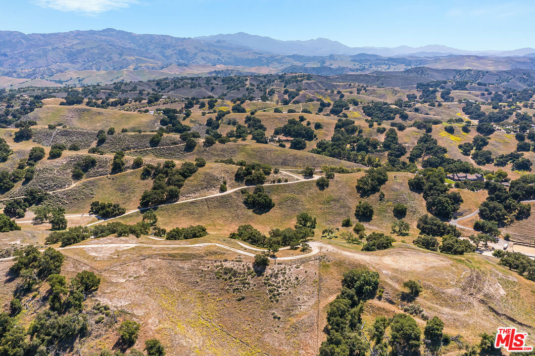 3349 Long Valley Road Santa Ynez, CA 93460 - Photo 16 of 22 an aerial view of residential house with yard and mountain view in back