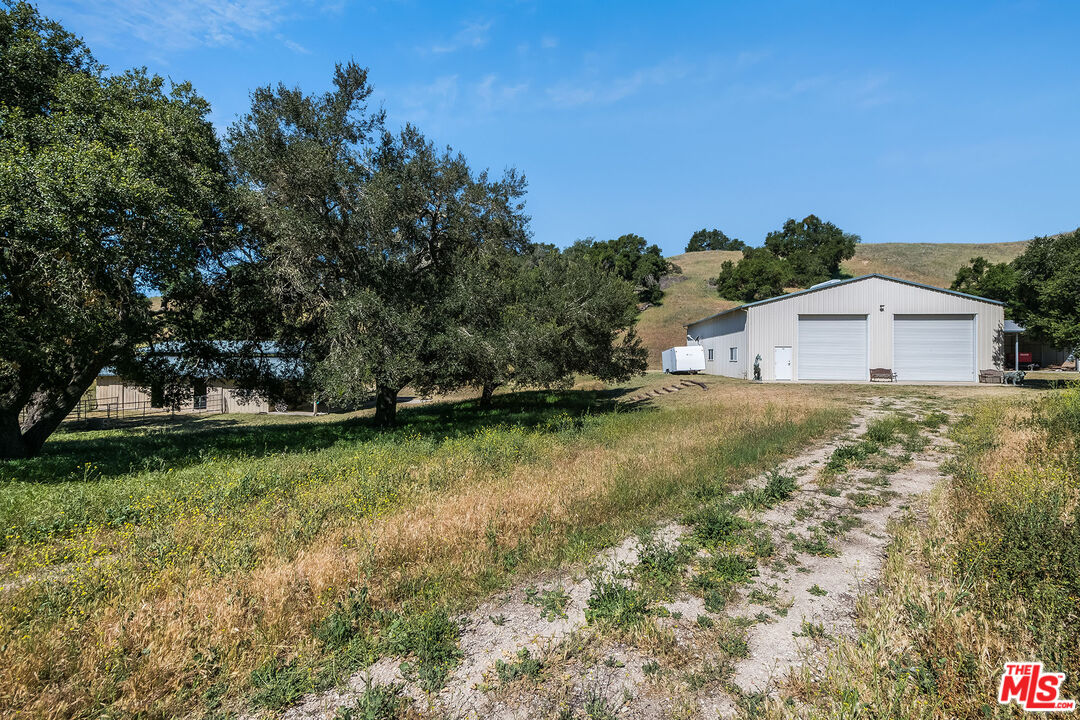 3349 Long Valley Road Santa Ynez, CA 93460 - Photo 3 of 22 a view of a house with a yard