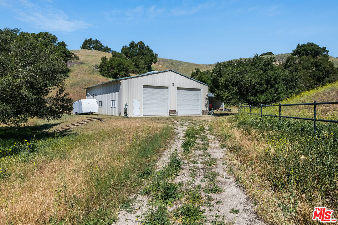 3349 Long Valley Road Santa Ynez, CA 93460 - Photo 4 of 22 a view of a house with a yard