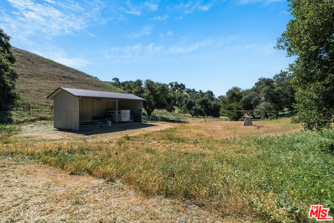 3349 Long Valley Road Santa Ynez, CA 93460 - Photo 7 of 22 a backyard of a house with lots of green space