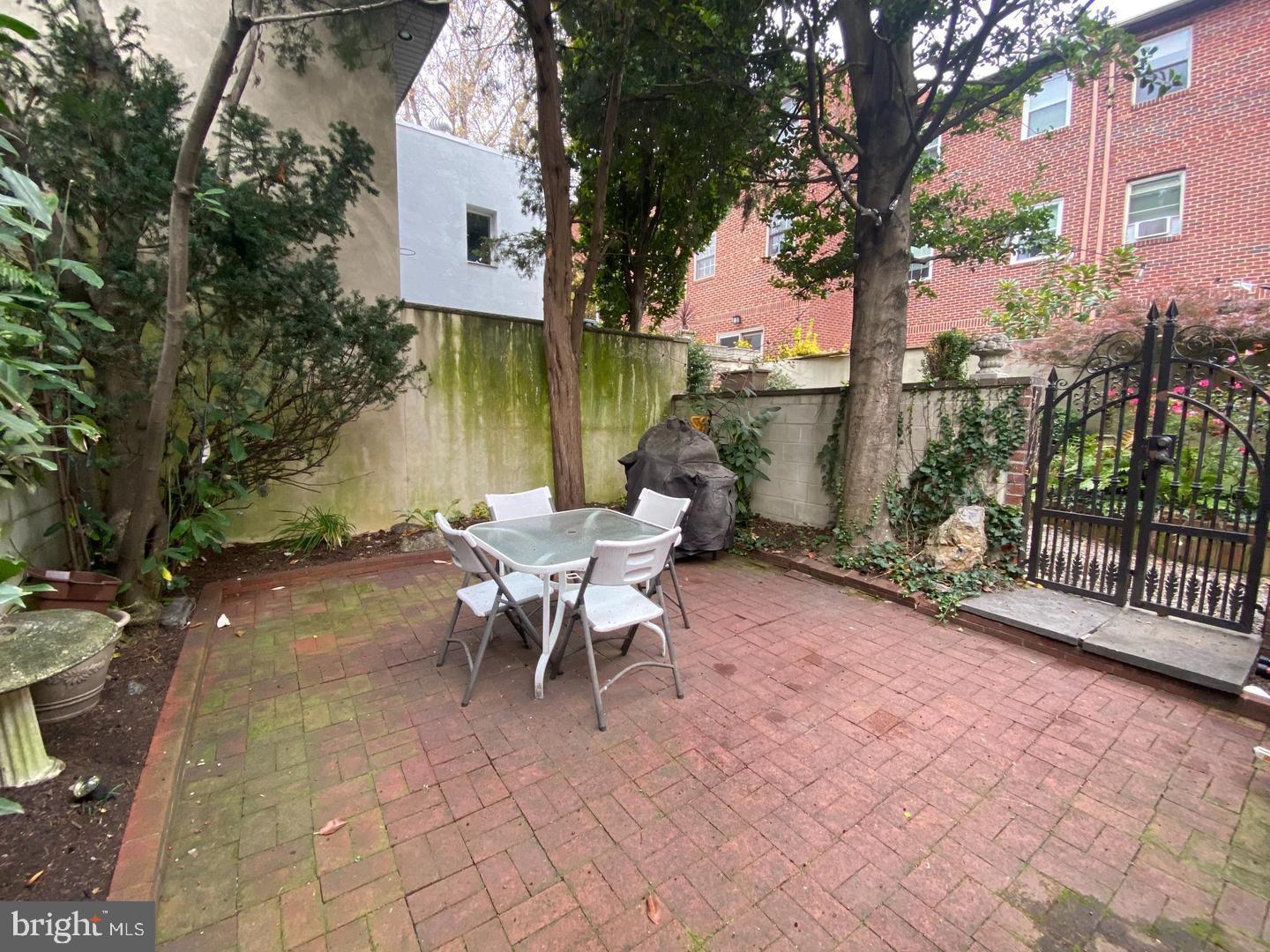 790 South Front Street Philadelphia, PA 19147 - Photo 11 of 12 a view of a patio with table and chairs under an umbrella