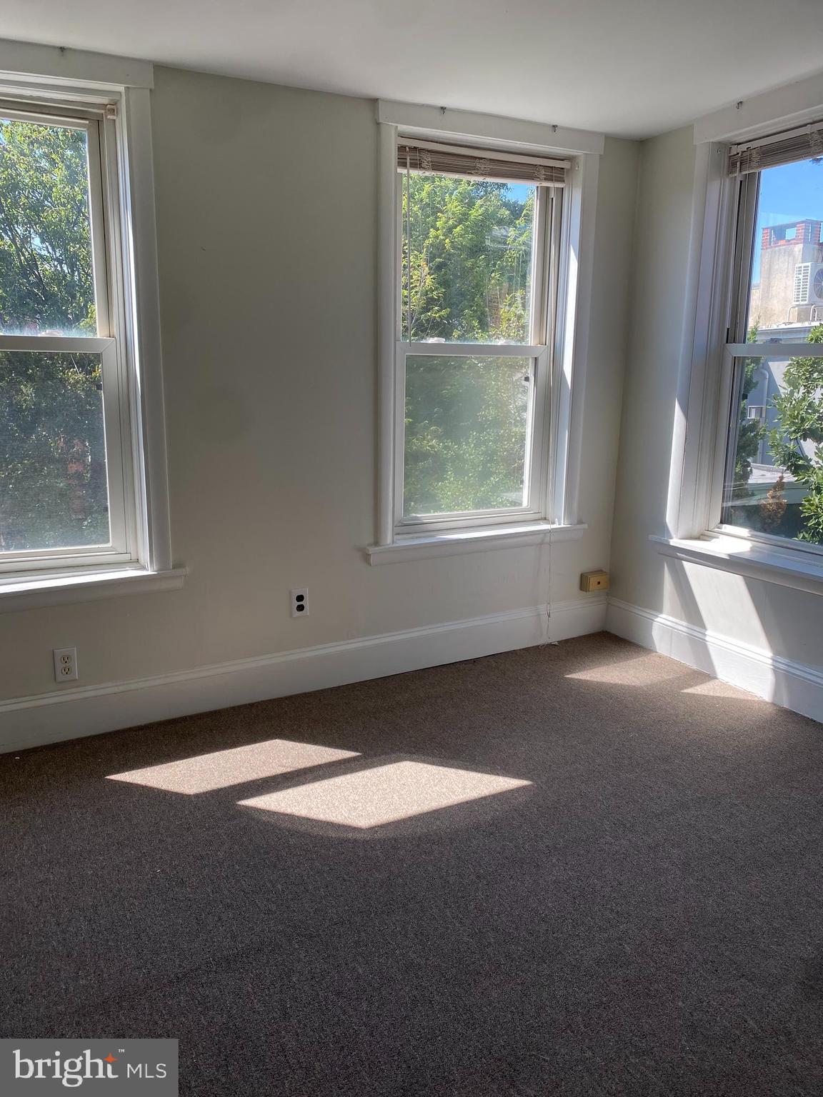 790 South Front Street Philadelphia, PA 19147 - Photo 9 of 12 a view of a livingroom with an empty space and a window