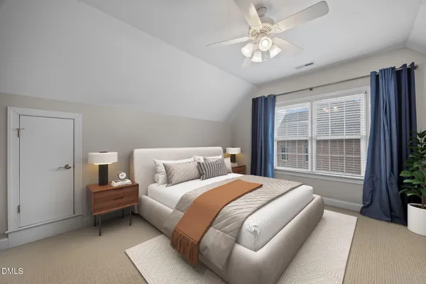 an empty room with chandelier fan and windows