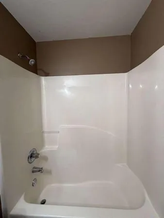 en view of an empty room with a window