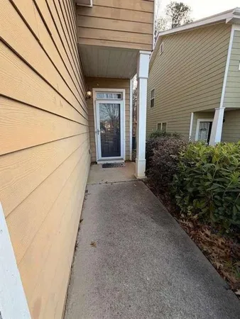 a view of a livingroom with furniture and wooden floor