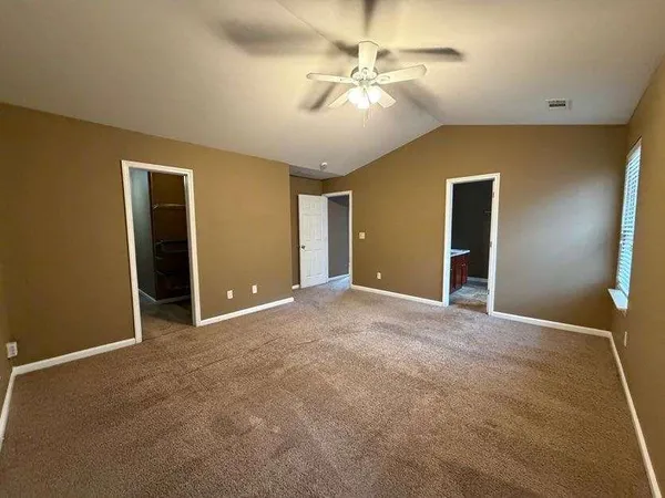 a empty room with wooden floor