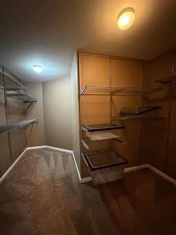 a bathroom with a sink a vanity and a mirror