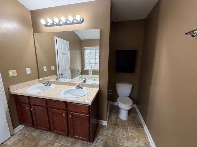 a bathroom with a toilet