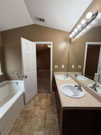 a view of a bathroom with a bathroom