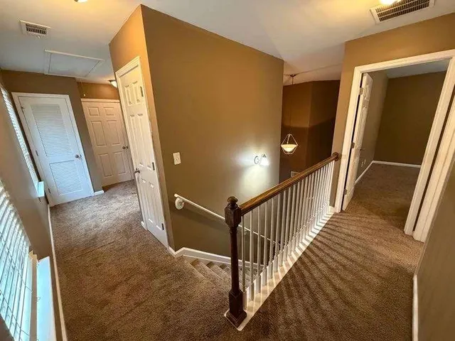 a view of a room with racks on the wall