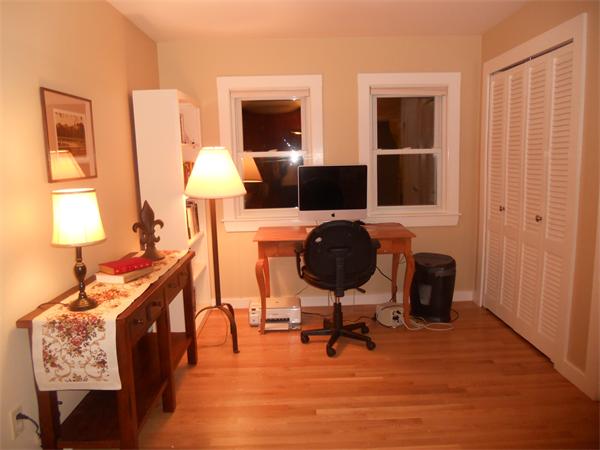 500 Marrett Road Lexington, MA 02421 - Photo 11 of 16 a workspace with furniture and lamp