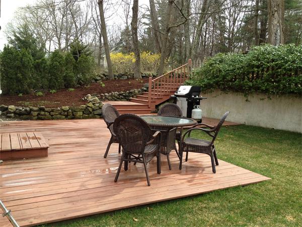500 Marrett Road Lexington, MA 02421 - Photo 12 of 16 a view of a outdoor kitchen with a patio