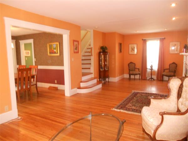 500 Marrett Road Lexington, MA 02421 - Photo 4 of 16 a living room with furniture a wooden floor and next to a window