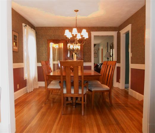 500 Marrett Road Lexington, MA 02421 - Photo 6 of 16 a view of a dining room with furniture and wooden floor